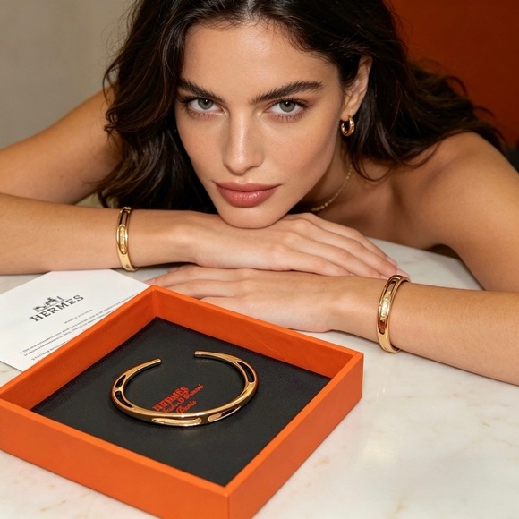 Hermes. Jewelry - Hermes Gold Openwork Cuff Bracelet